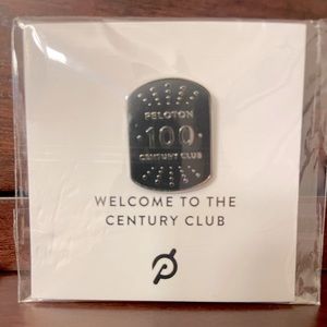 New Peloton Century Club pin. Never opened, never used.
